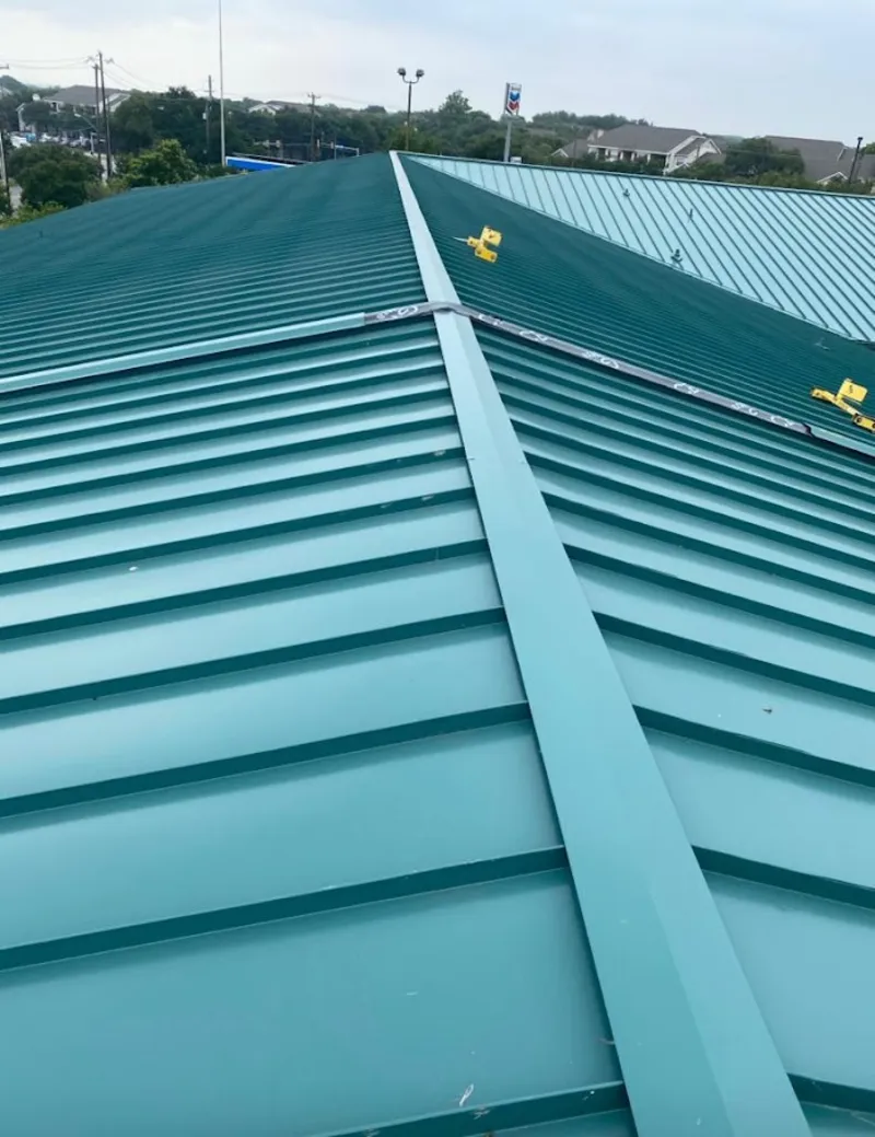 Green commercial metal roof ridge and valley for Metal Roof Repair in Quincy